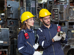 female student training with ship engineer