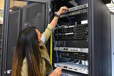 community college student working on network server